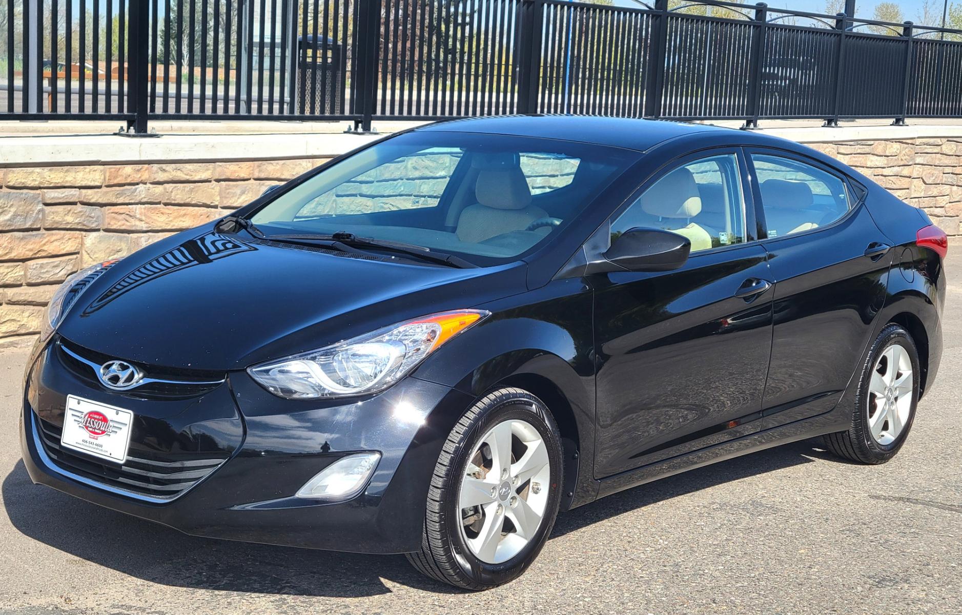 2013 Black /Tan Hyundai Elantra GLS (KMHDH4AE8DU) with an 1.8L I4 engine, 6 Speed Auto transmission, located at 450 N Russell, Missoula, MT, 59801, (406) 543-6600, 46.874496, -114.017433 - Low Mile Front Wheel Drive Sedan. One Owner. Excellent Fuel Economy. 1.8L I4 Engine. 6 Speed Automatic Transmission. AirConditioning. Power Windows and Locks. Bluetooth. - Photo #5